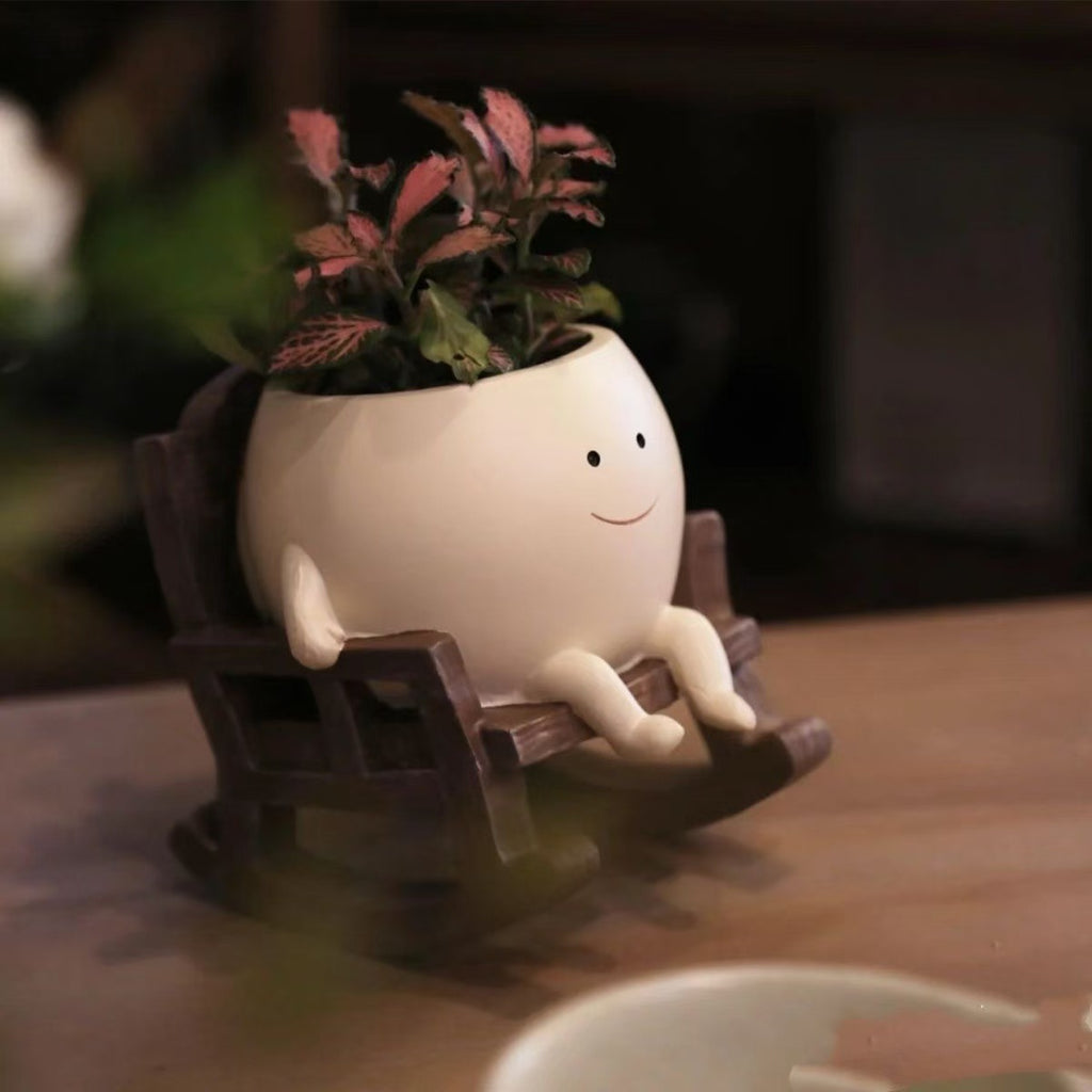 Smiley face rocking chair shaped resin flower pot