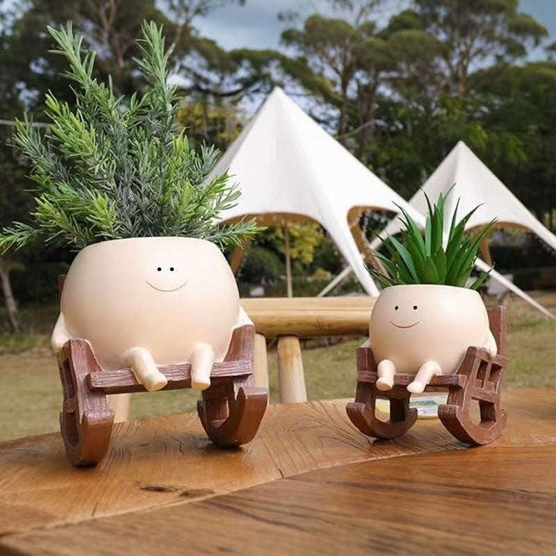 Smiley face rocking chair shaped resin flower pot
