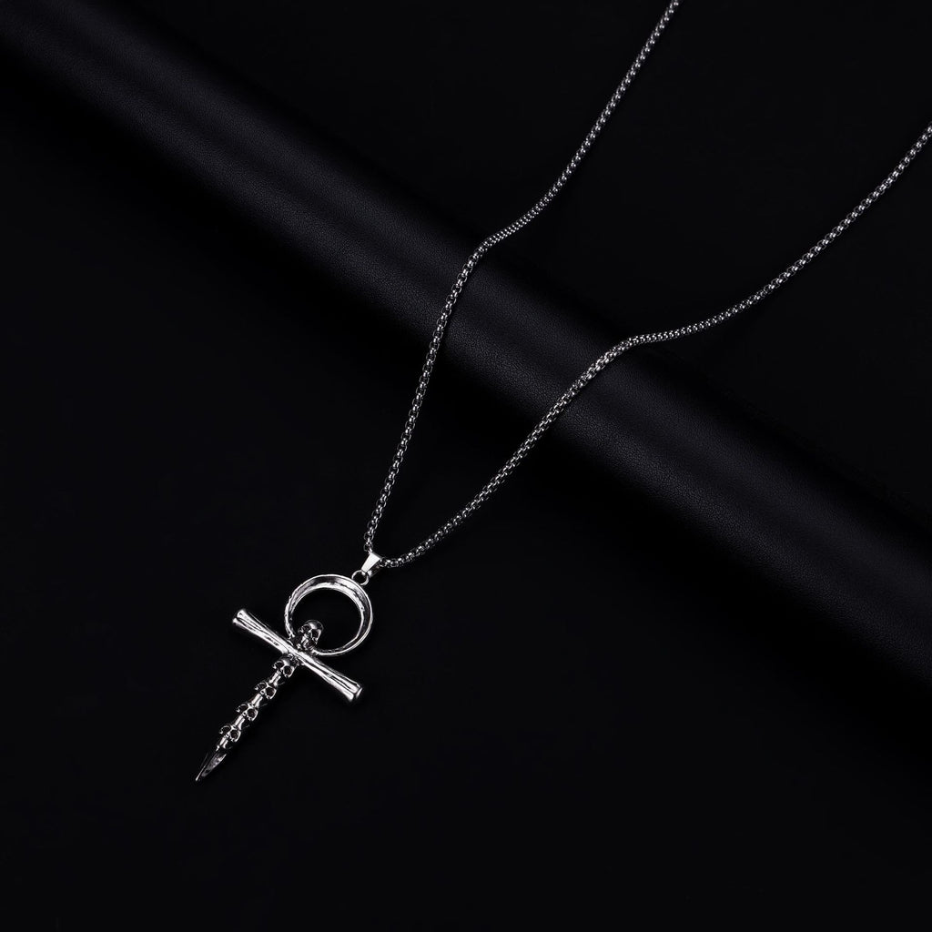 Multi-skull cross necklace
