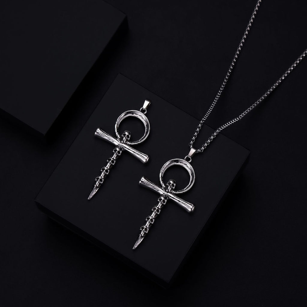 Multi-skull cross necklace