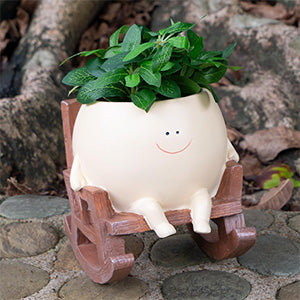 Smiley face rocking chair shaped resin flower pot