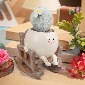 Smiley face rocking chair shaped resin flower pot
