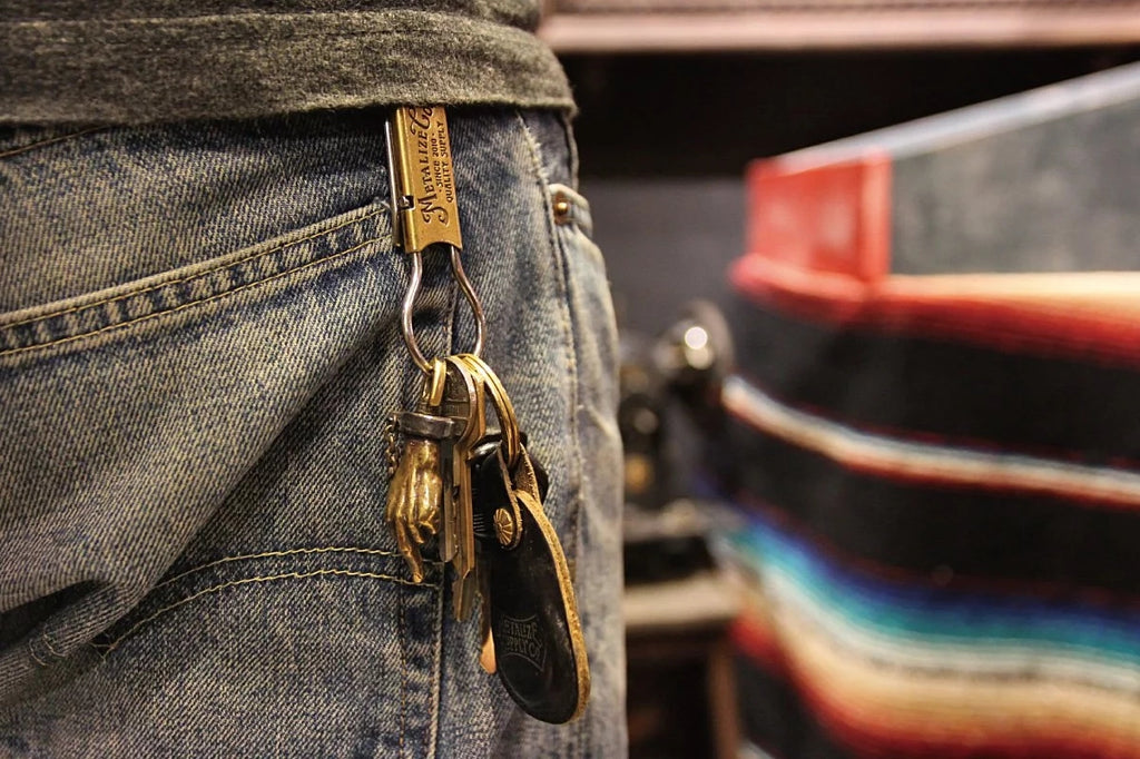 Brass skull helmet bell charm