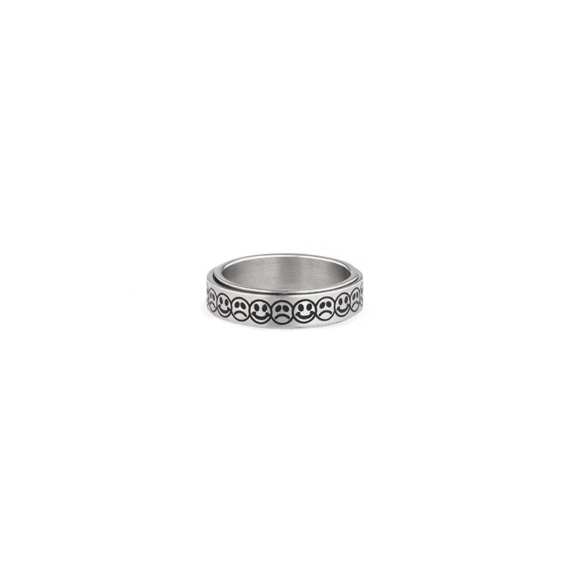 Rotatable smiley face ring