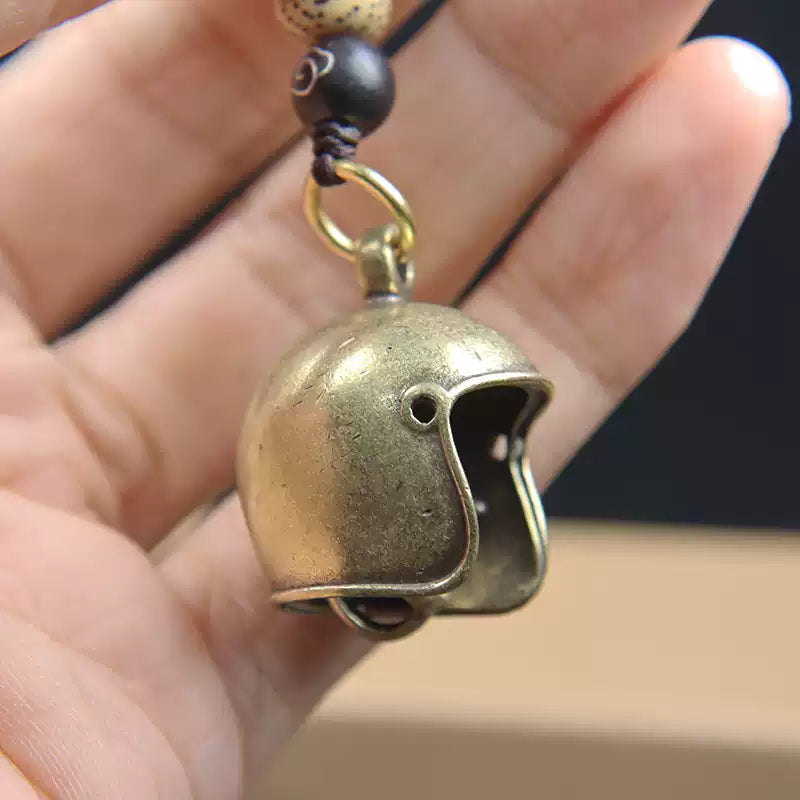 Brass skull helmet bell charm